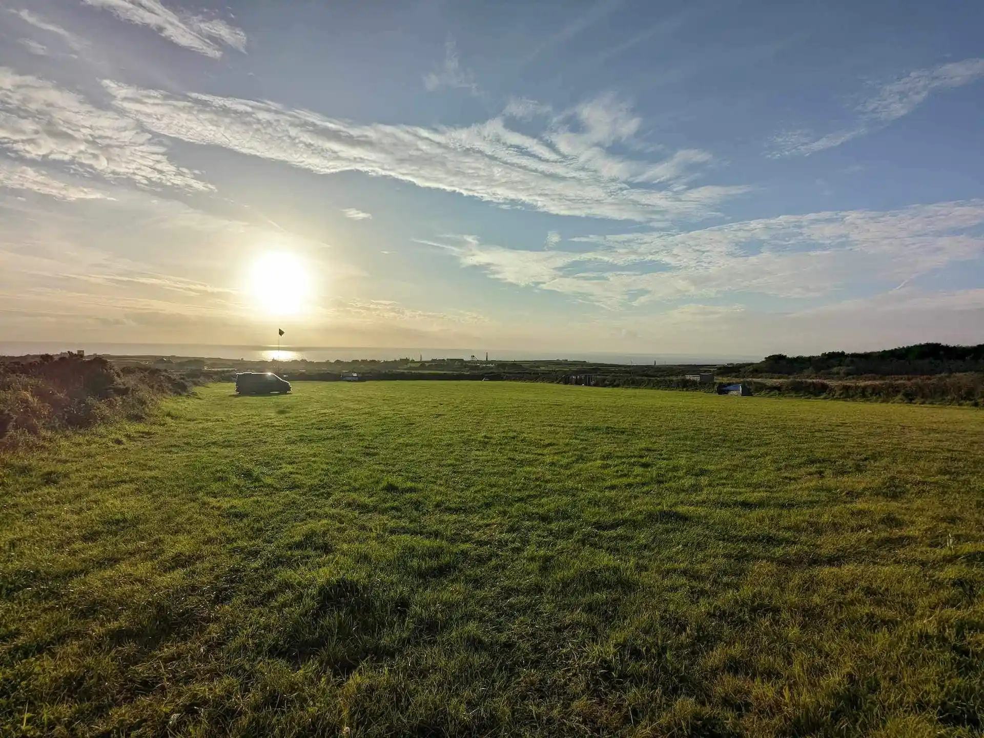 Campfire burning at night in Dark Sky Park Cornwall