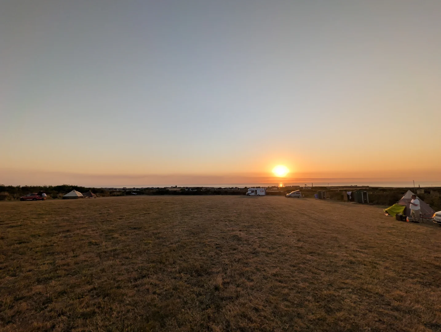 Endless horizon across Sunset meadow